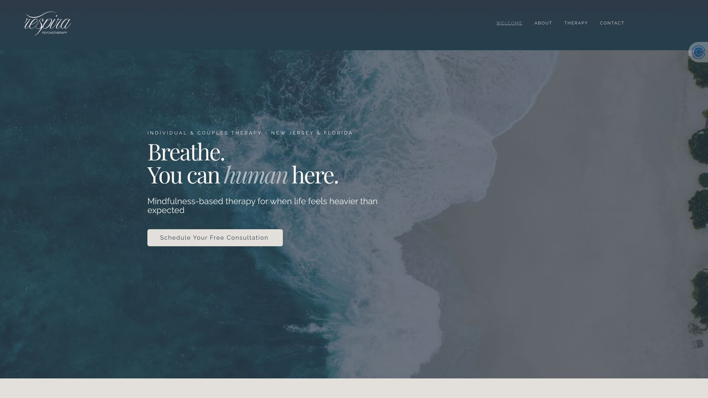 The Respira website template, from the Coastal Abuela design: Breathe. You can human here, over an aerial ocean photo, in navy.
